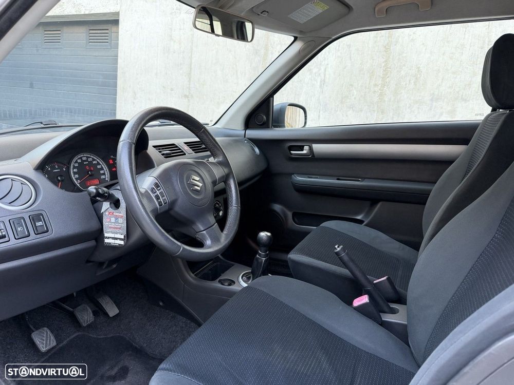 Suzuki Swift 1.3 DDiS GLX - 9