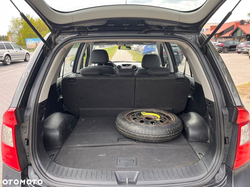 Kia Carens 2.0 CVVT LX - 13