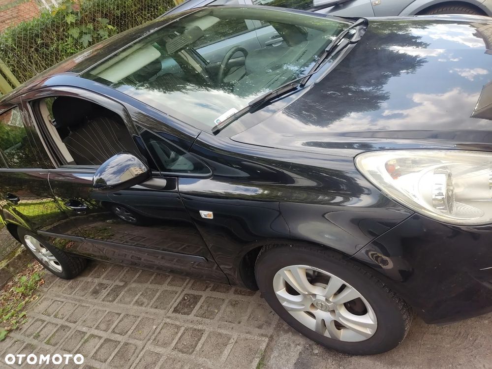 Opel Corsa 1.4 16V Enjoy - 5