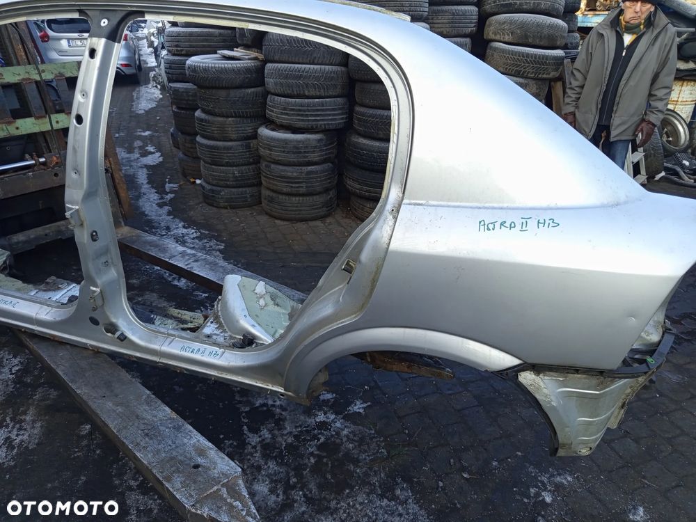 BŁOTNIK TYLNY LEWY LUB PRAWY OPEL ASTRA II G 5D - 1