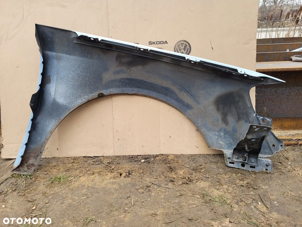 BŁOTNIK LEWY PRZÓD VW PASSAT B6 - 2