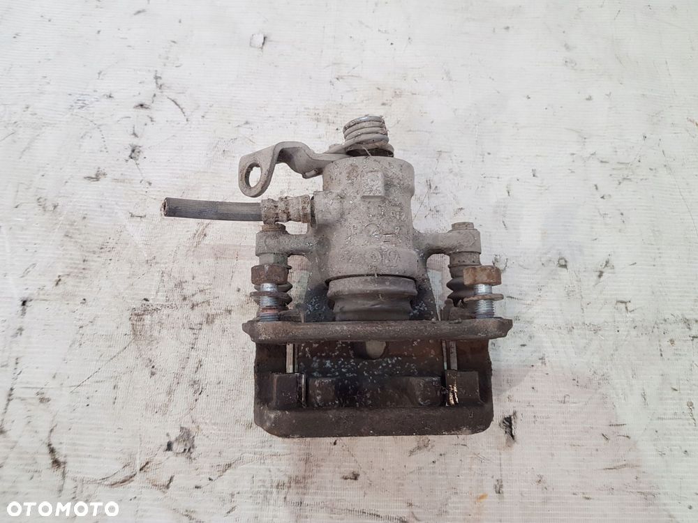 zacisk hamulcowy prawy tył fiat 500l 1.3d 12r- - 6