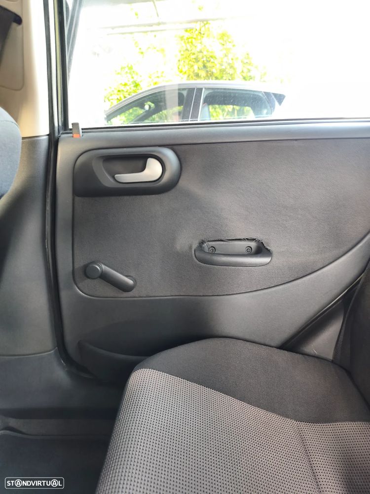 Opel Corsa 1.2 16V Enjoy - 14