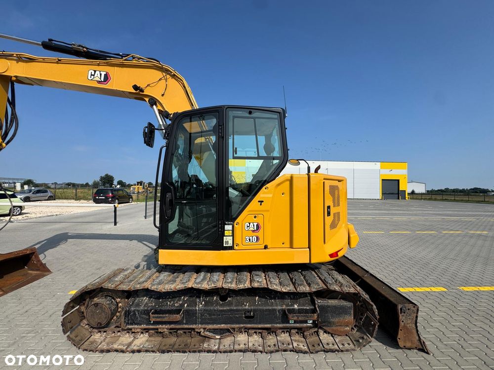 Caterpillar 310 - 6