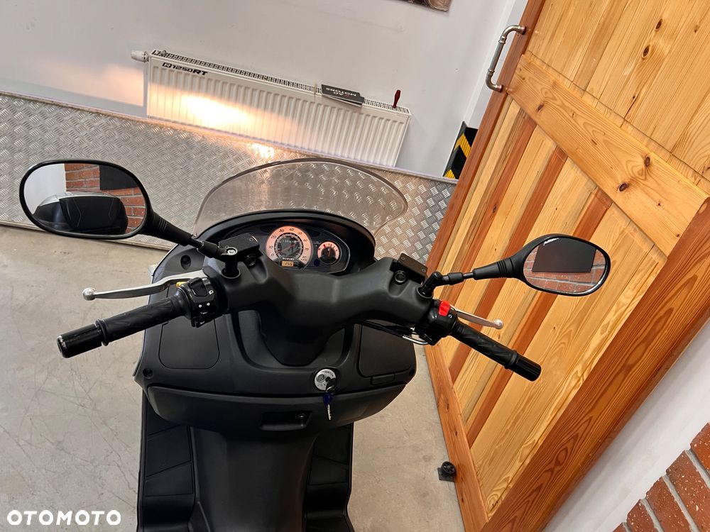 Suzuki Burgman - 21