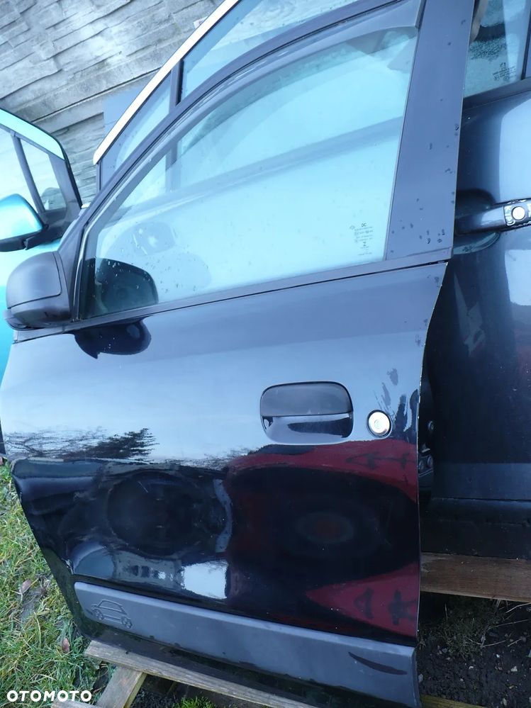 TWINGO 3 III 14- DRZWI LEWE PRZOD TEGNE EU. - 2