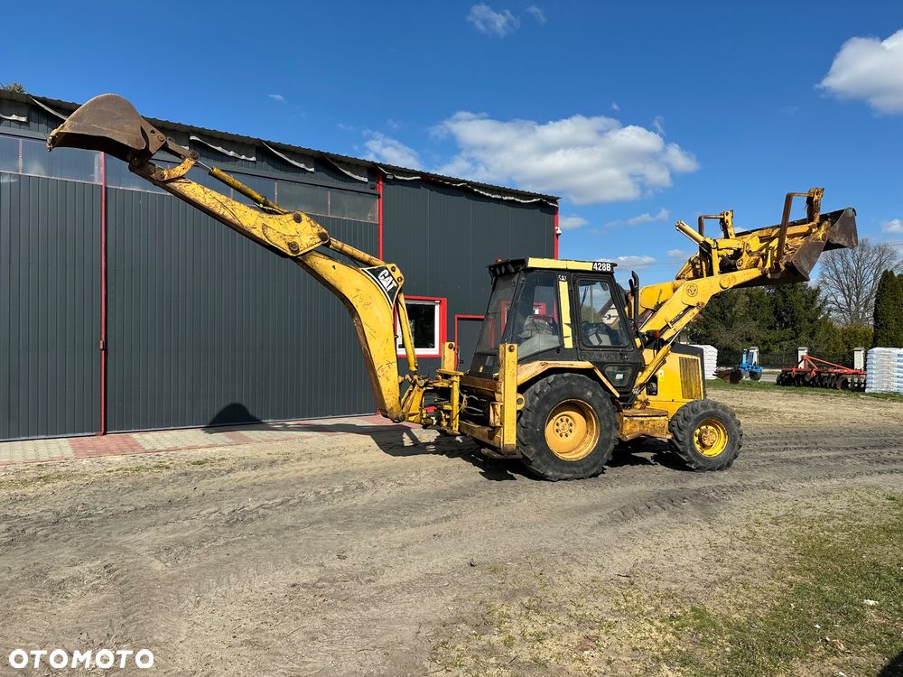 Caterpillar 428B ramię typu Banan - 2