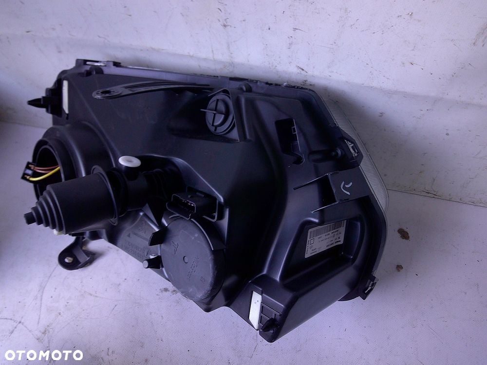dacia duster i 1 lampa przód lewa nowa oryginał z uszk - 9