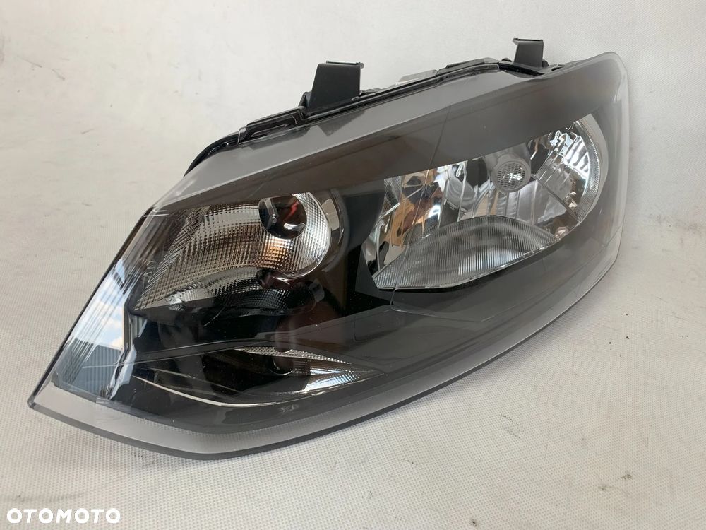Volkswagen Polo 08-14r Reflektor lewy lampa lewa VW TYC