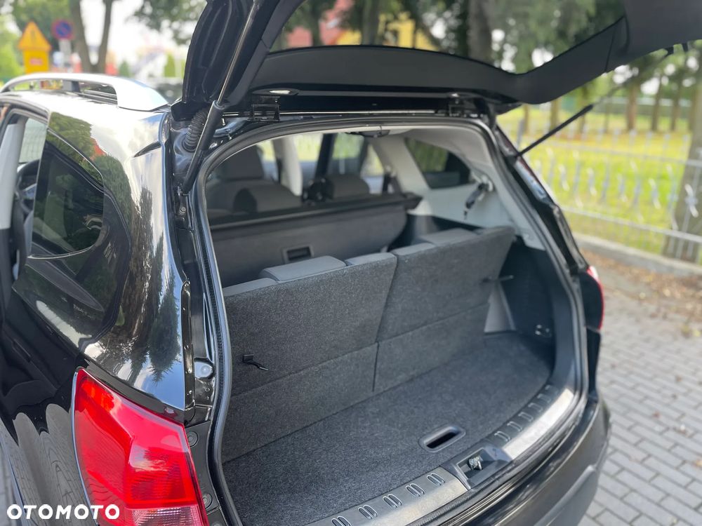 Nissan Qashqai+2 - 15