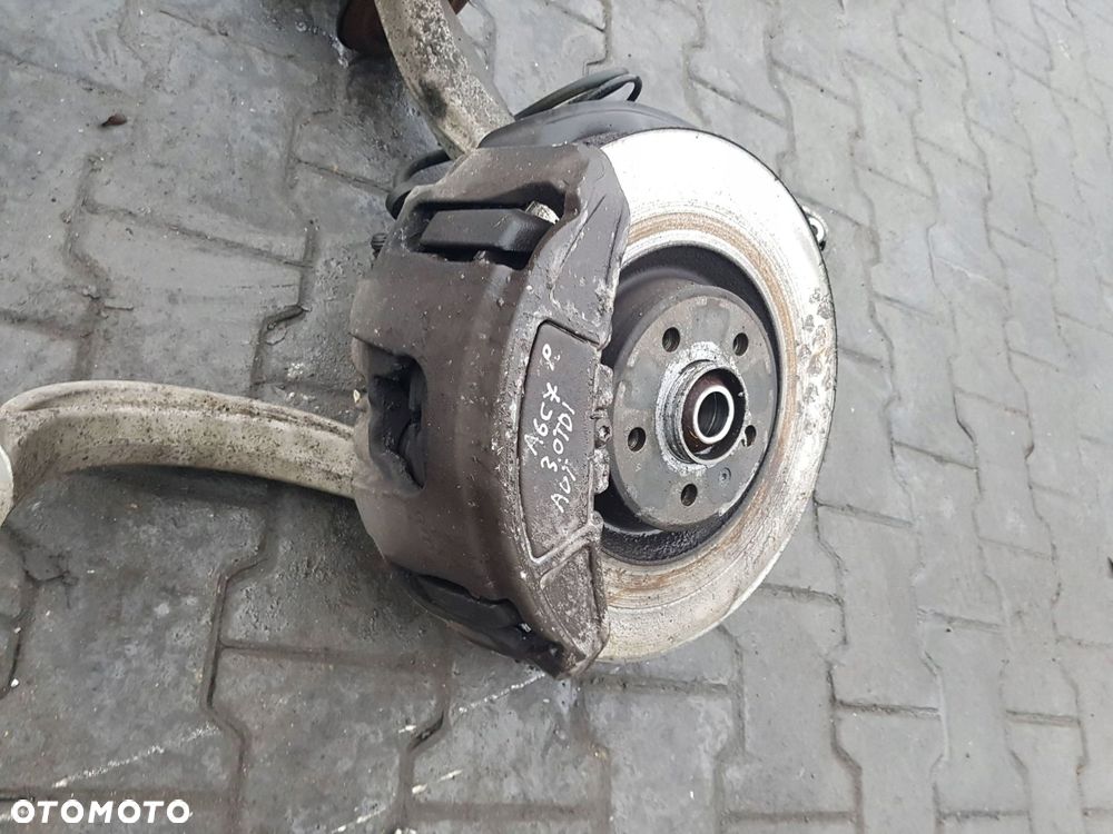 AUDI A6 C7 10-14r 3.0 TDI AMORTYZATOR ZWROTNICA PRAWA PRZÓD 4G0407242C - 2