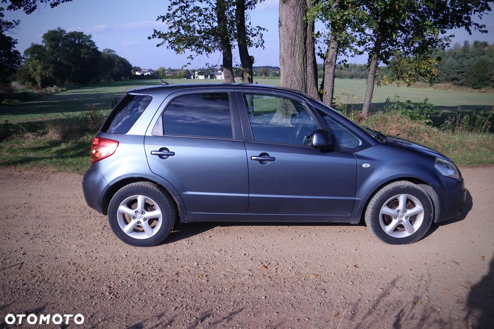 Suzuki SX4 1.6 GLX / Comfort - 14