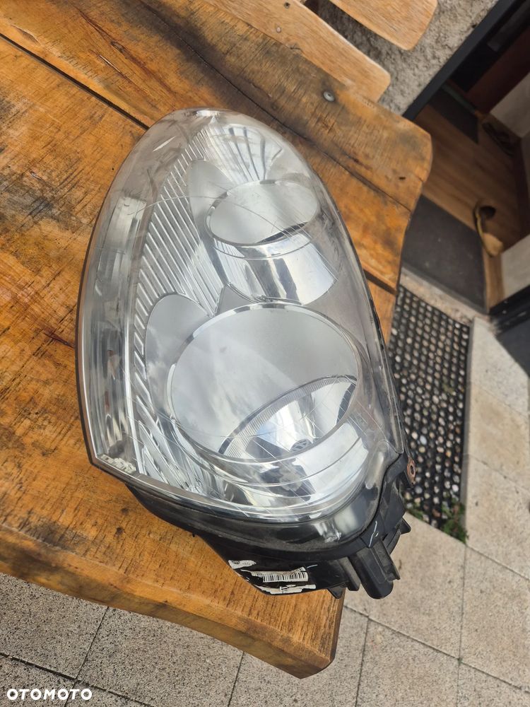 ORYGINALNA LAMPA LEWA VW GOLF V 5 PRZEDNIA - 1
