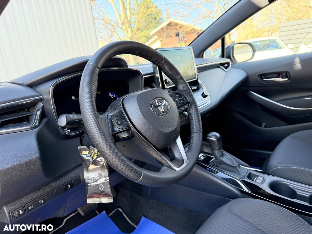 Toyota Corolla 1.8 HSD TS Exclusive - 32