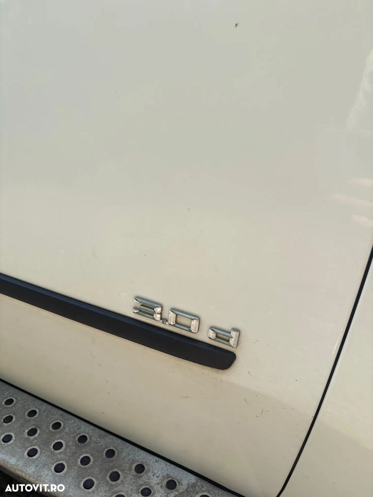 BMW X5 2009 — imagine 12