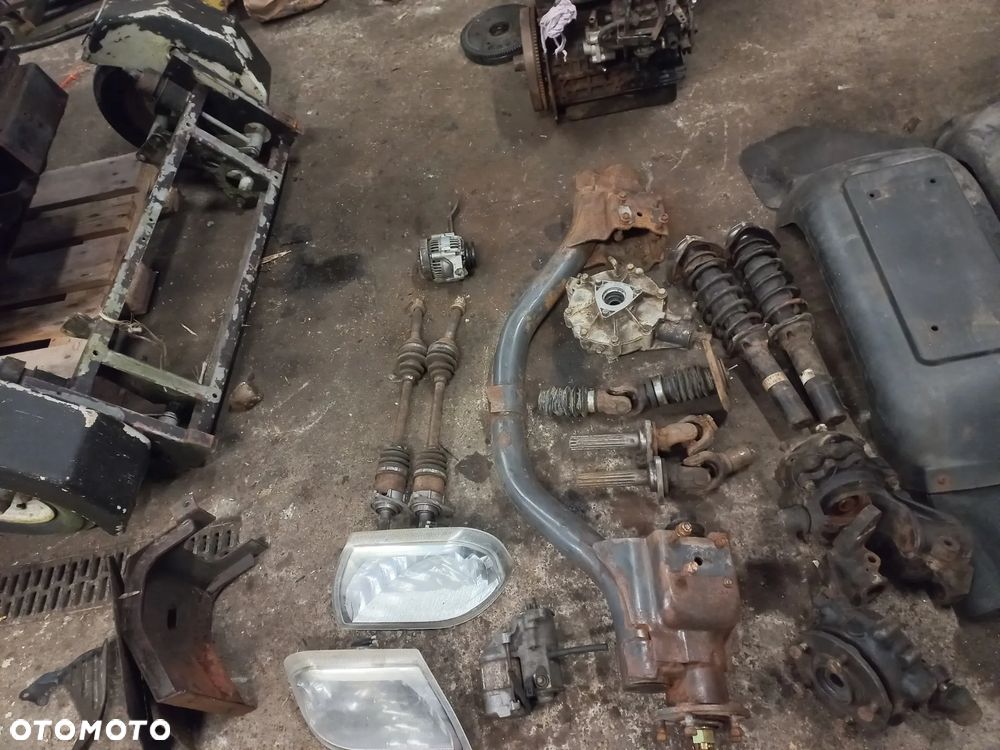 Części Kubota RTV900 silnik,skrzynia,most,zawieszenie,ATV,4x4,1140,1100c,x1110,koła,rama,maska,kabina - 16