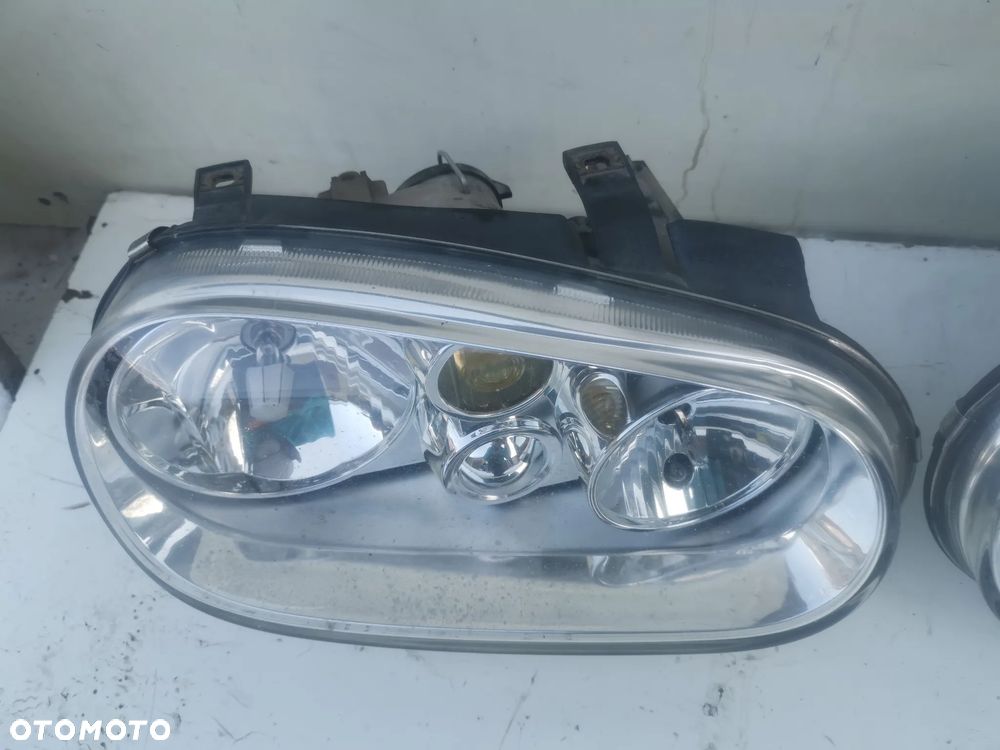 LAMPA PRZEDNIA PRAWA VW Golf IV 4- Europa Oryginał - 1