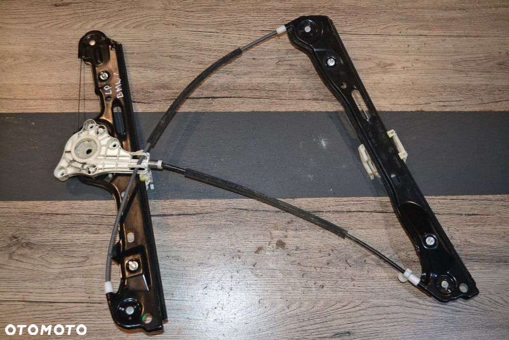 BMW E87 PODNOŚNIK MECHANIZM OPUSZCZANIA SZYB EL LEWY PRZÓD PRZEDNI 7067795S 7138465E - 1