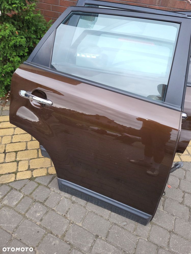 Drzwi tylne prawe kia sorento 2 fl 2012r kompletne lakier nbm