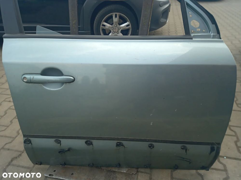 Hyundai Tucson drzwi przod przednie prawe BU - 3