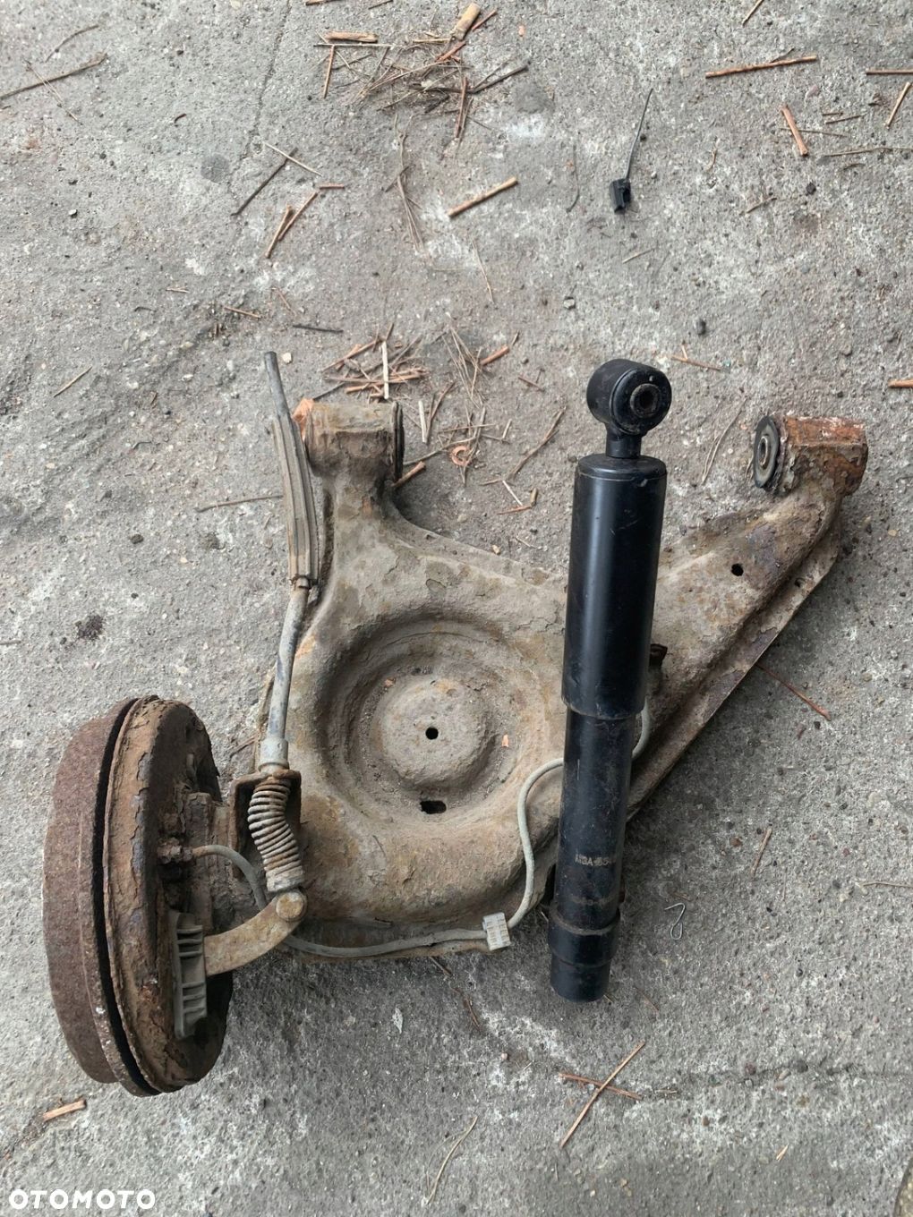 Fiat Seicento/600 Tył strona lewa Wahacz tylny WWA - 1
