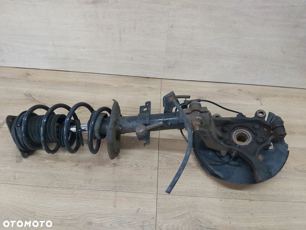 Nissan Qashqai II J11 mcperson amortyzator zwrotnica lewy przód 1,2 DIG-T - 4