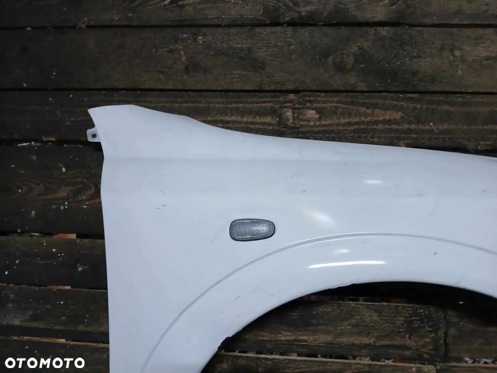 Opel Astra II G Błotnik prawy - 3