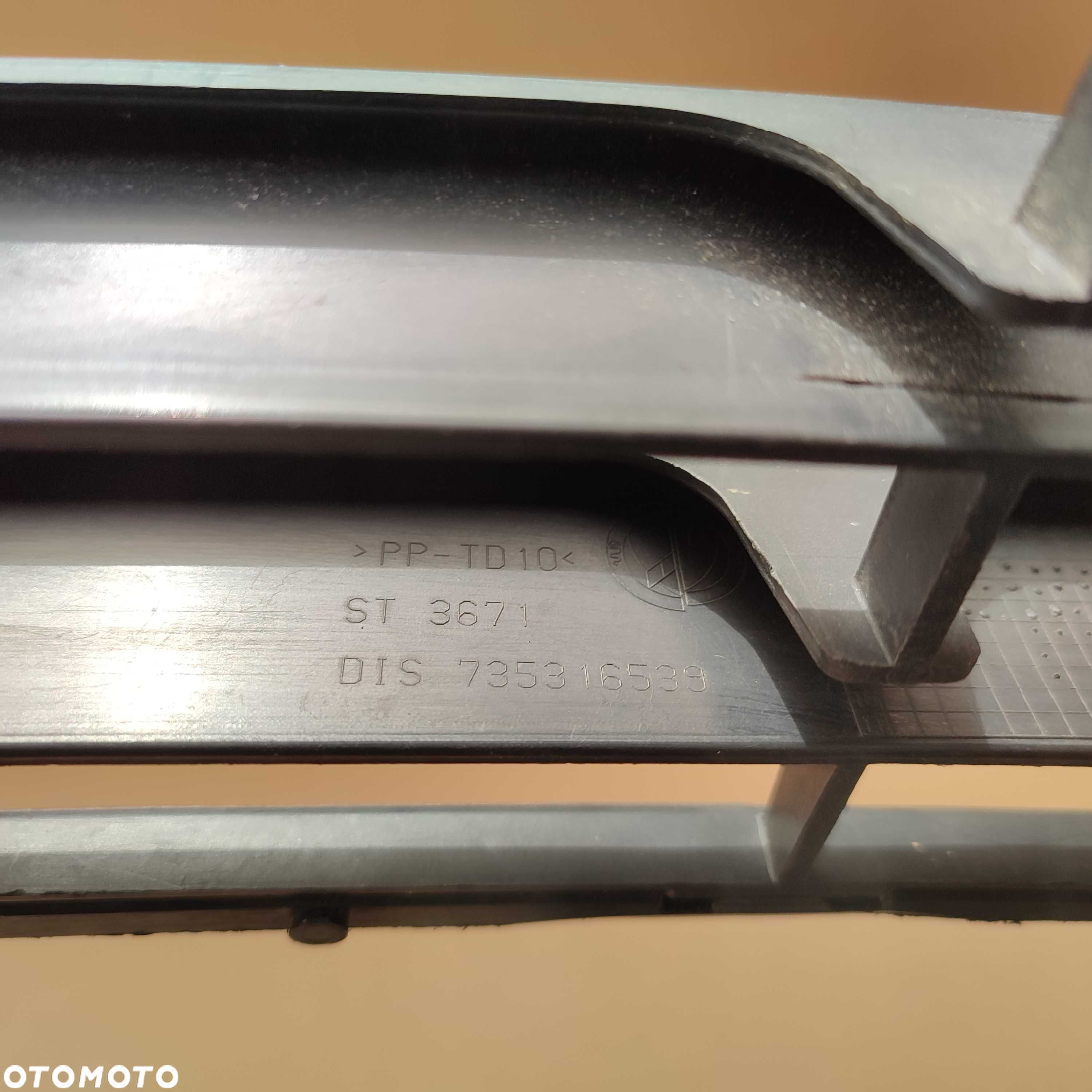 Fiat Idea 04-11 kratka zderzaka środkowa przód przednia oryg igła - 7