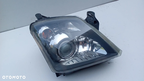 Lampa prawa soczewka skrętna Opel Meriva a lift Europa bdb cała