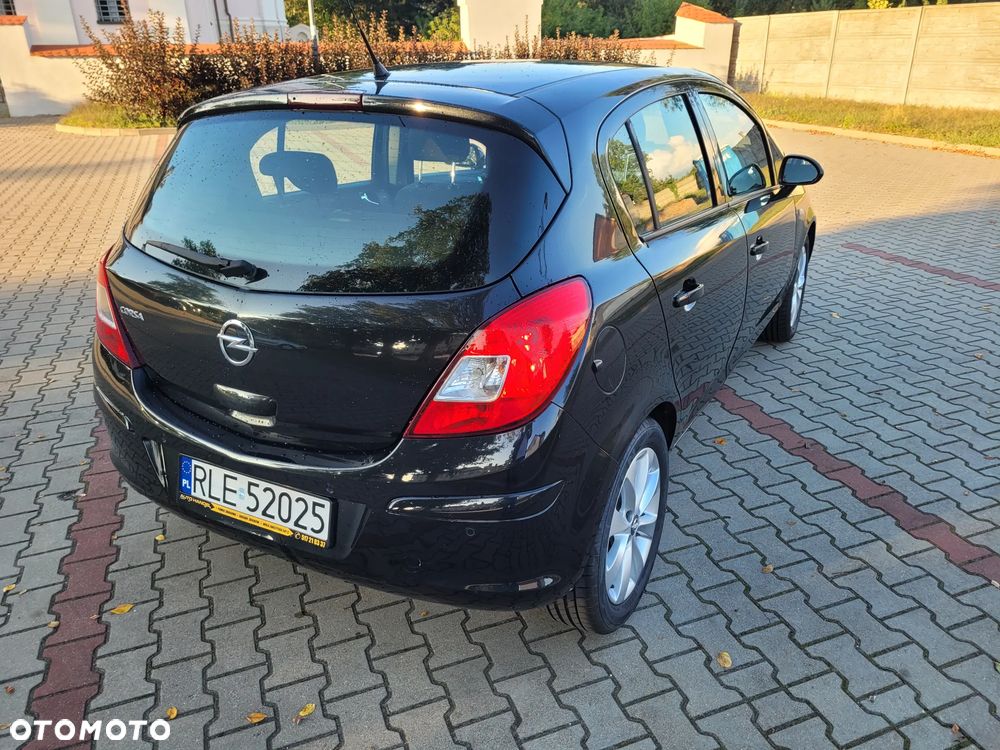 Opel Corsa 1.4 16V Enjoy - 6