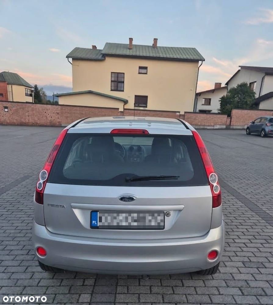 Ford Fiesta 1.4 Ghia - 4