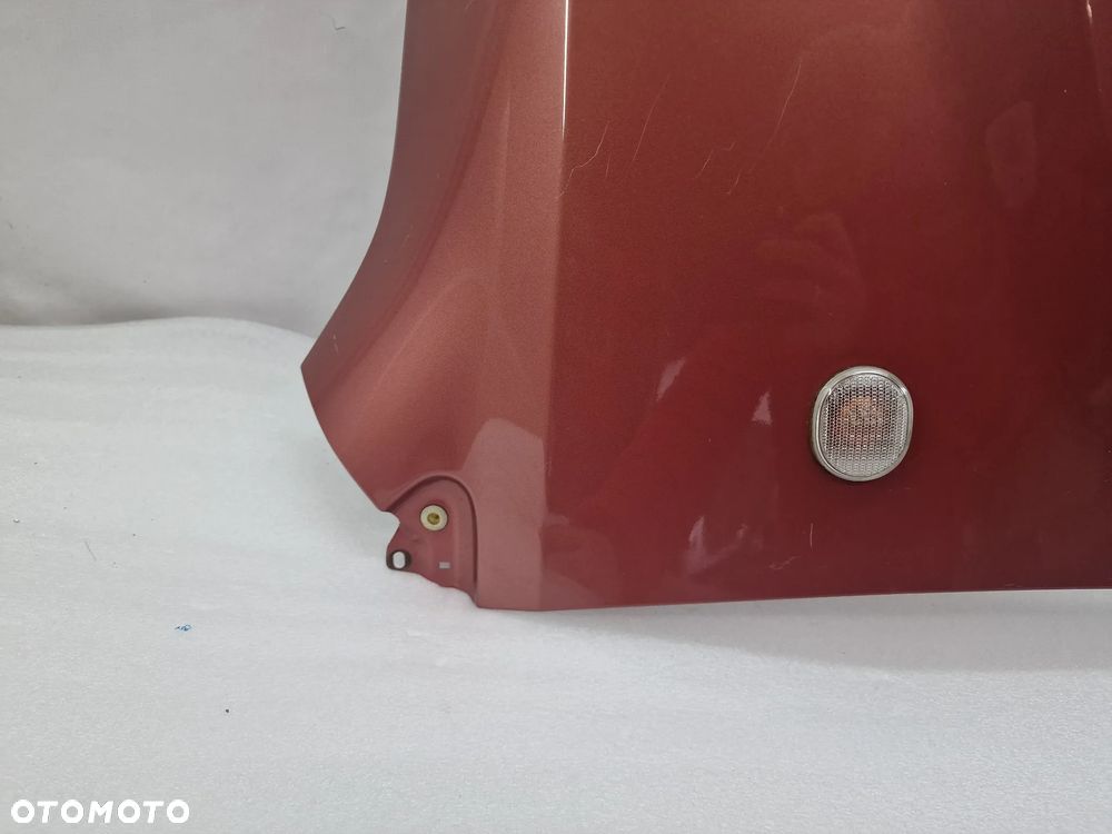 DAIHATSU SIRION II 05- PRAWY BŁOTNIK PRZEDNI PRZÓD , RÓŻOWY , NR AUKCJI BŁ88 - 11
