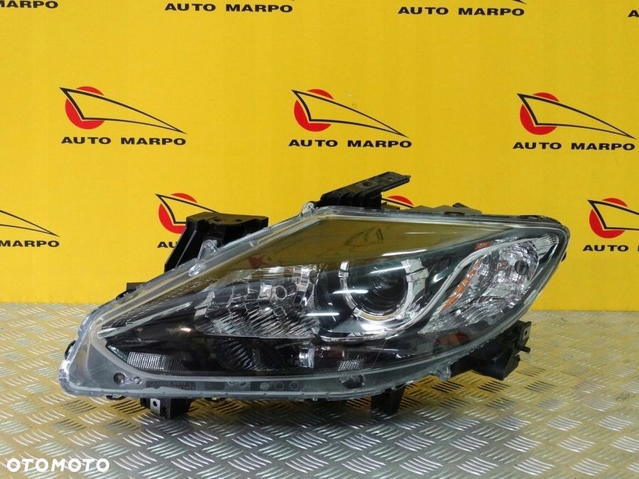 MAZDA CX9 LIFT 2012- REFLEKTOR LAMPA ZWYKŁA SOCZEWKOWA LEWA USA - 2