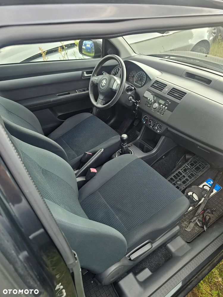 Suzuki Swift 1.3 Club - 7
