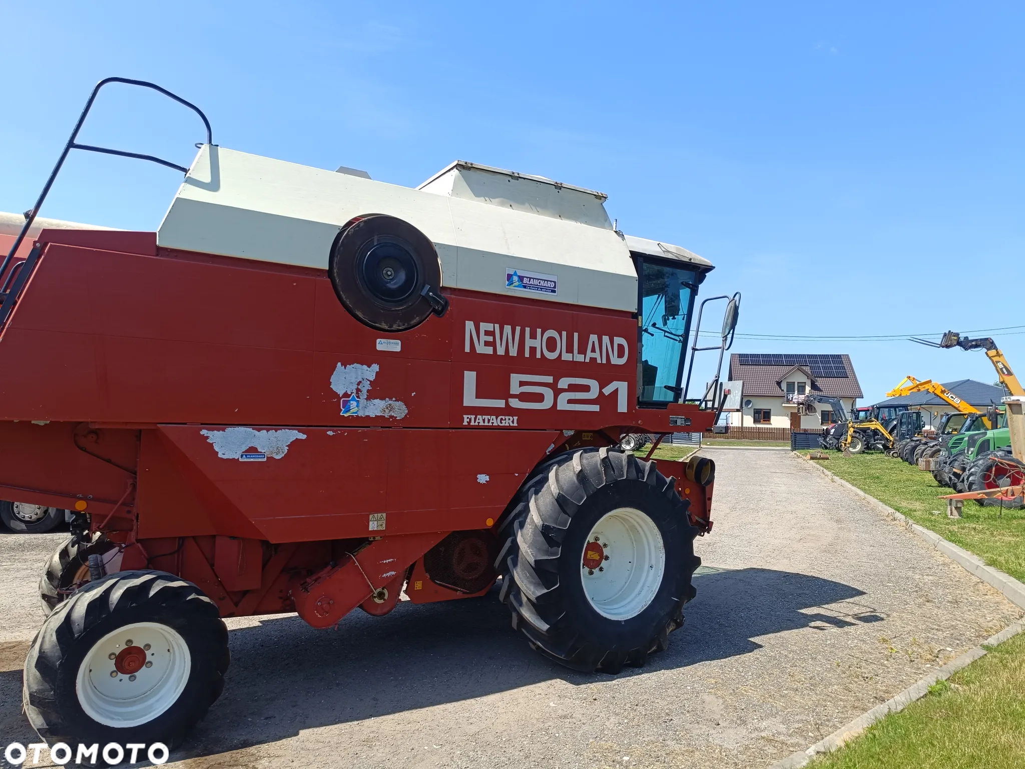 New Holland L521 - 8