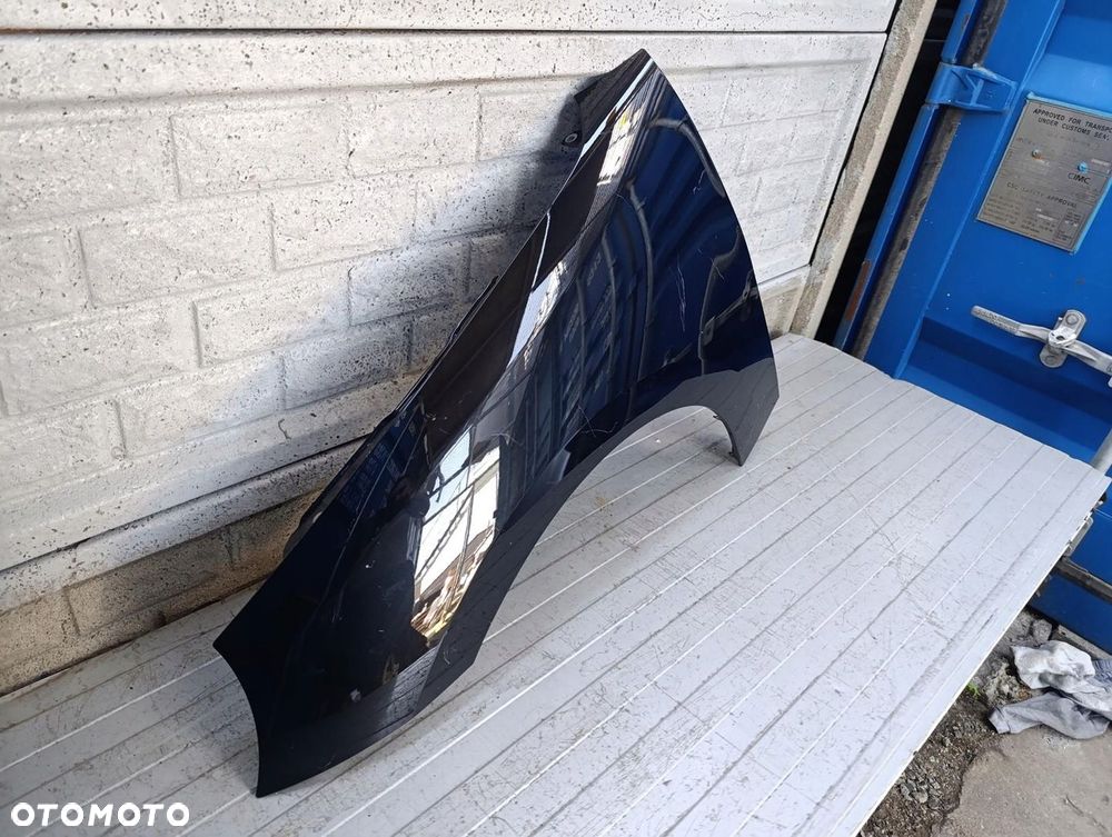 MINI COOPER HATCH IV E 2023- BŁOTNIK LEWY PRZEDNI ORYGINAŁ - 2