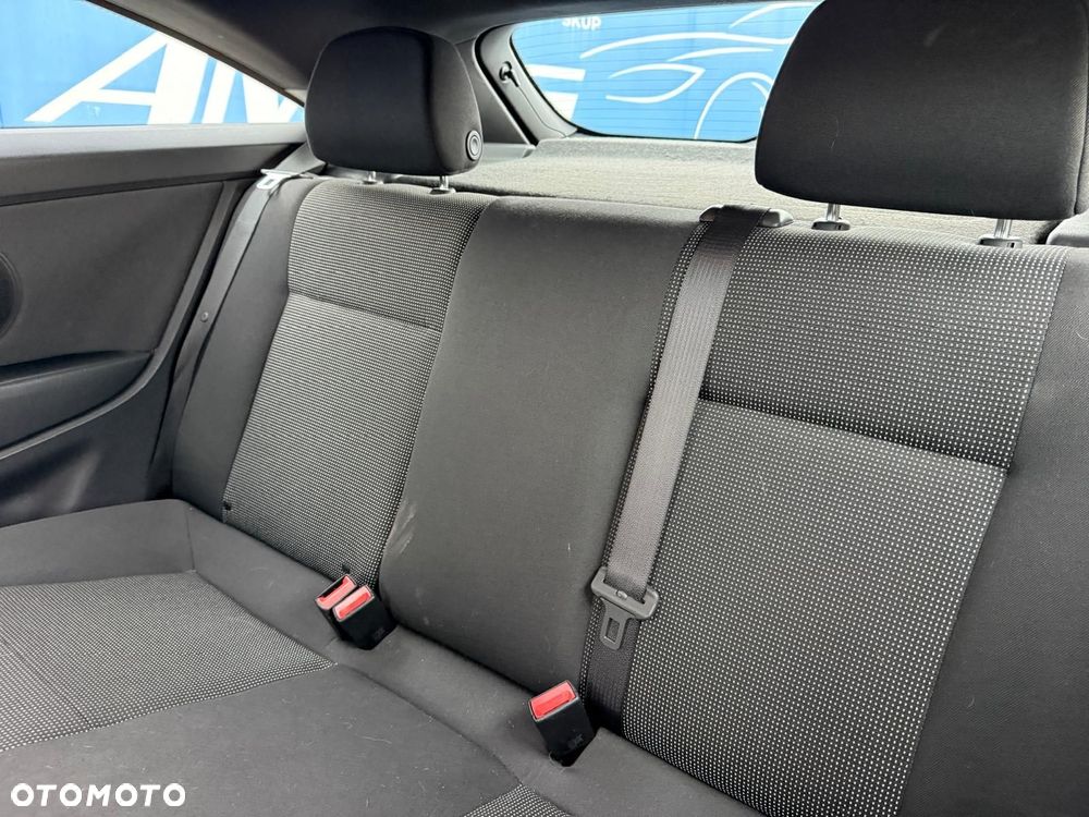 Opel Astra 1.6 Cosmo - 12