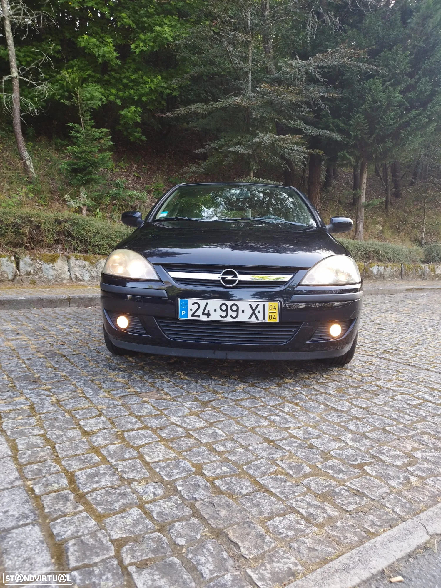Opel Corsa 1.2 16V Enjoy - 23