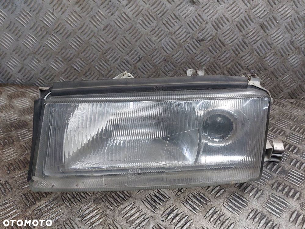LAMPA LEWY PRZÓD SKODA OCTAVIA I HELLA - 1