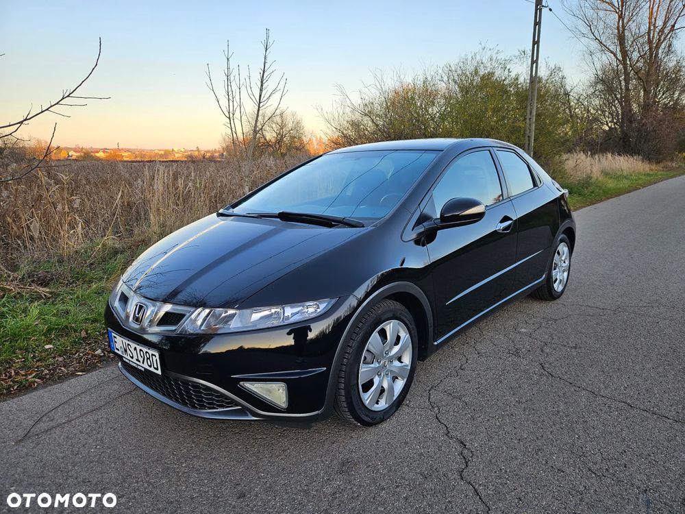 Honda Civic 1.4 i-VTEC Elegance - 1