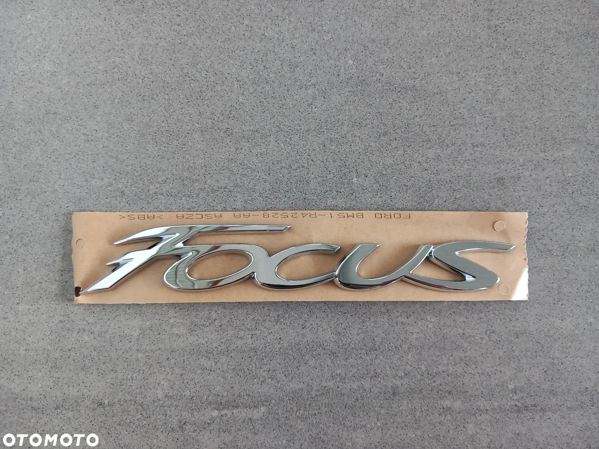 Emblemat znaczek Ford tył napis Focus 2011-2015 1714989 - 1