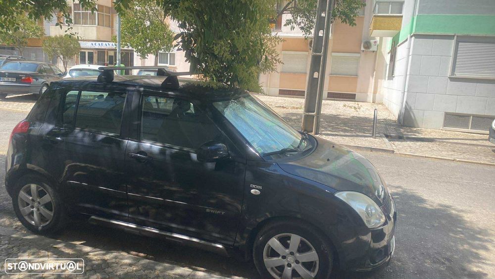 Suzuki Swift 1.3 DDiS Quiksilver - 8