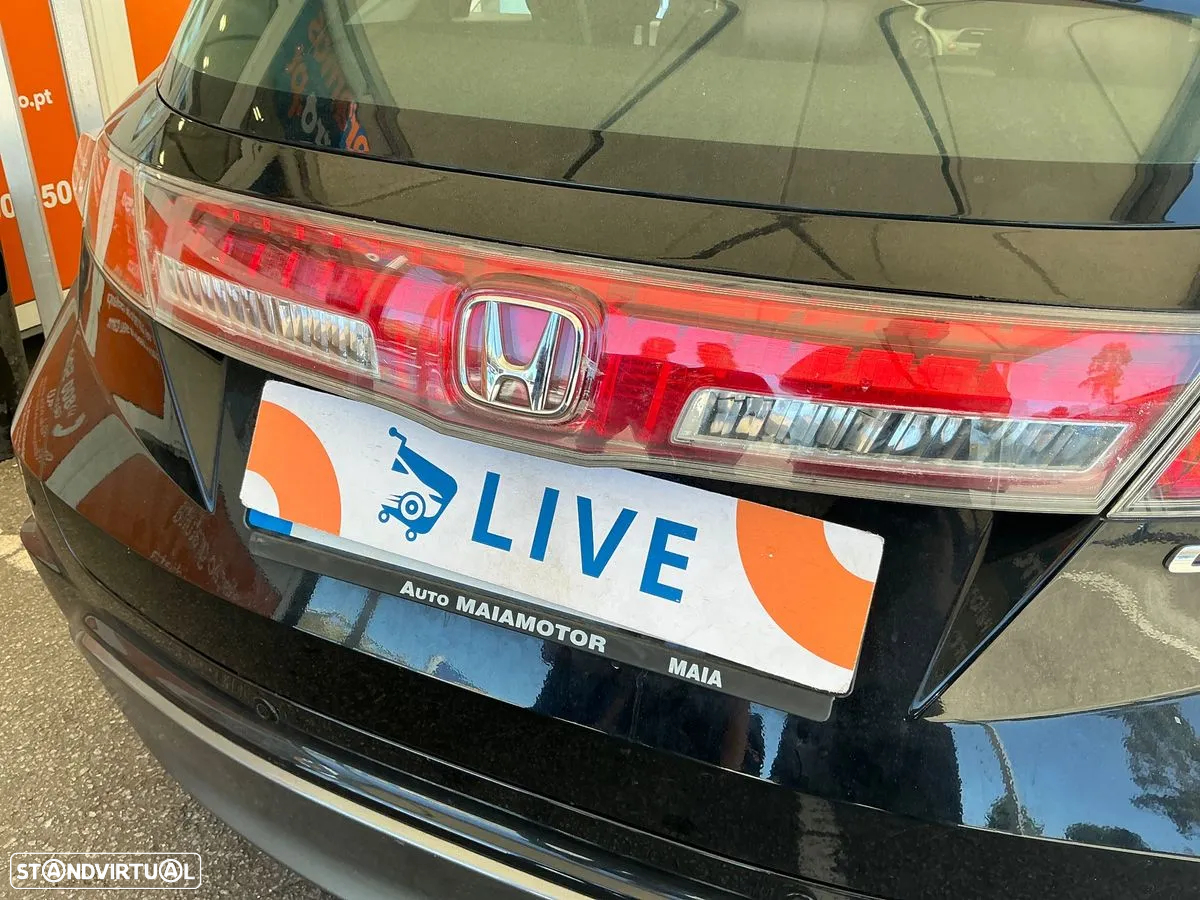 Honda Civic 1.4 i-VTEC Comfort - 23