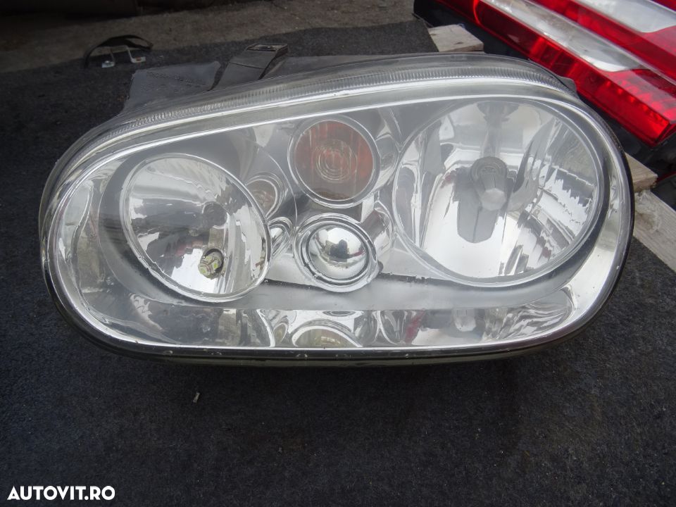 Far stanga Volkswagen Golf 4 volan pe stanga - 1