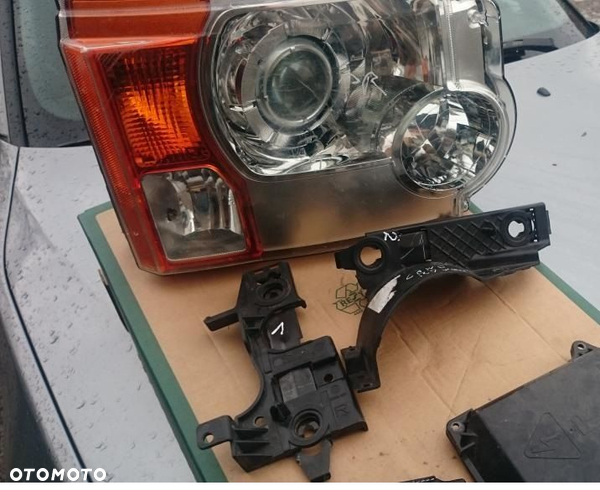 ŚLIZG PRAWY MOCOWANIE LAMPY LAND ROVER DISCOVERY 3