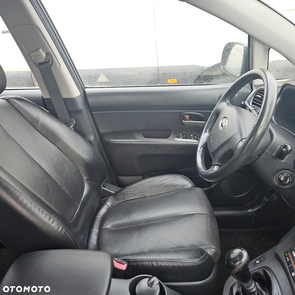 Kia Carens 2.0 CVVT LX Basis - 21