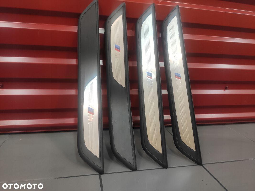 BMW 7 F01 F02 MPAKIET LISTWY PROGOWE OZDOBNE DRZWI PROGI KPL ORYGINAŁ BMW - 1