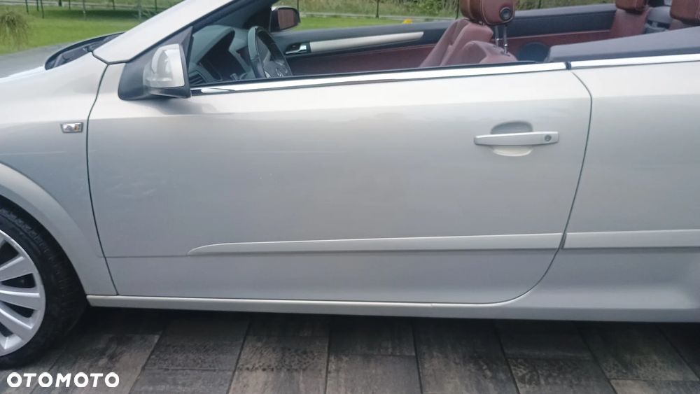 Opel Astra 1.8 Cosmo - 21