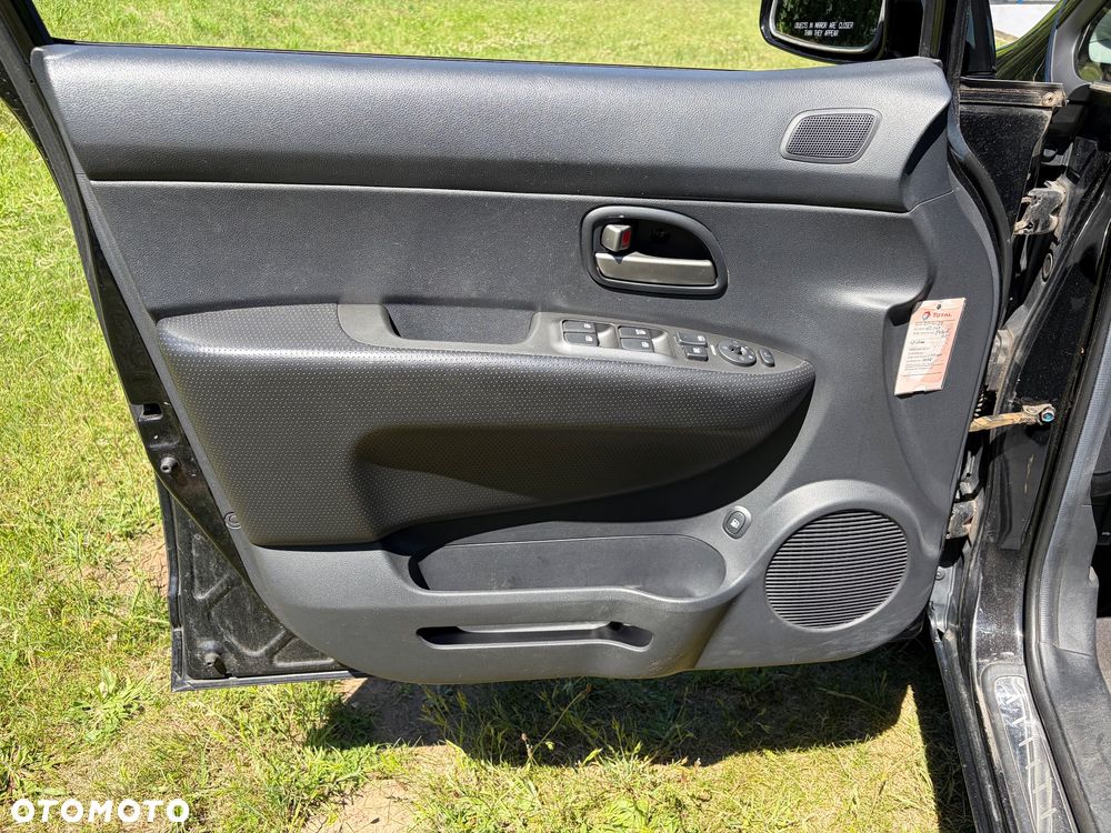 Kia Carens 2.0 CVVT EX Top - 21