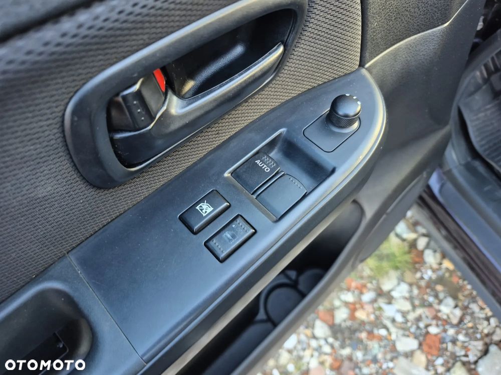 Suzuki Grand Vitara 1.6 - 11